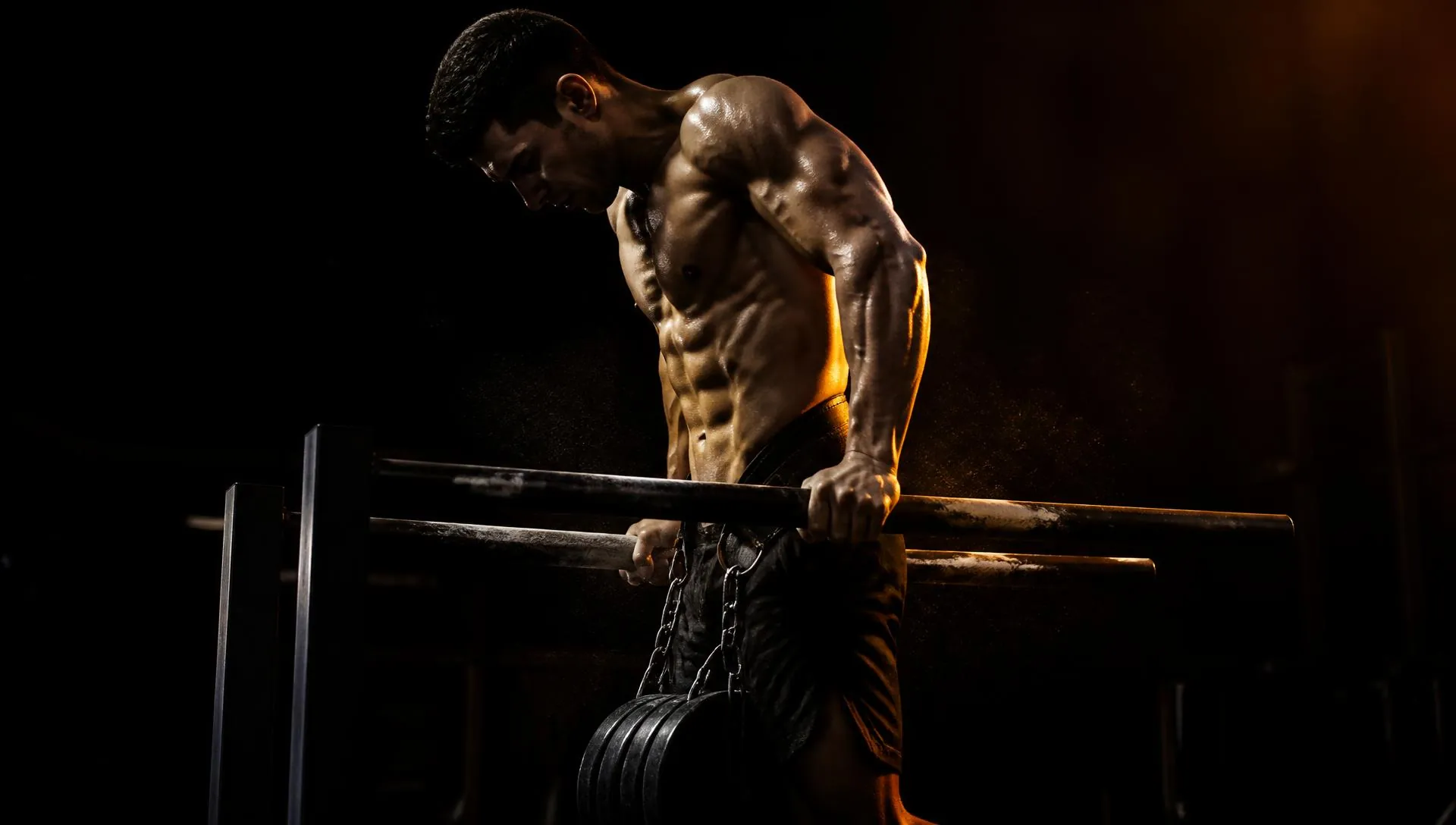 Athlete performing weighted dips with a dip belt